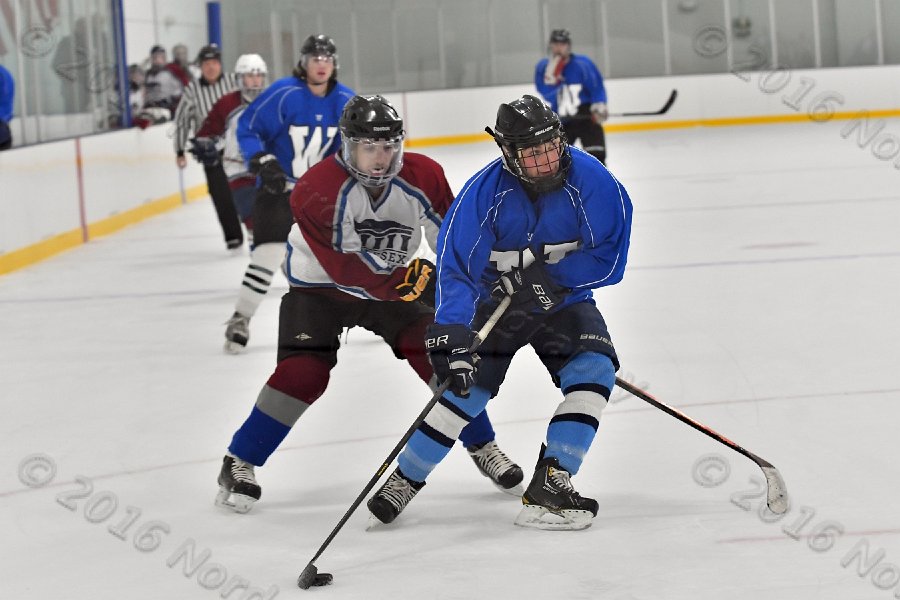 Wheaton College Men\'s Ice Hockey vs Middlesex Community College. - Photo By: KEITH NORDSTROM